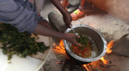 "Njoguini PA-MOJA club students put "Managu" to the fried onions and tomatoes.